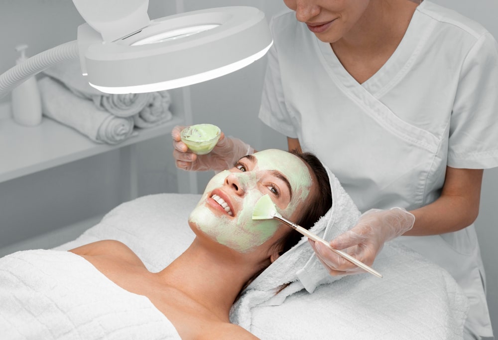 Dr. Arathy Jerald performing a medium chemical peel on a patient.