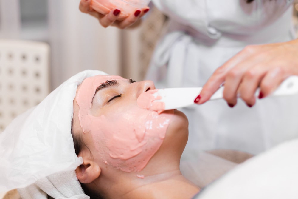 Patient receiving a superficial chemical peel treatment at Revive Skin & Cosmetology Clinic.