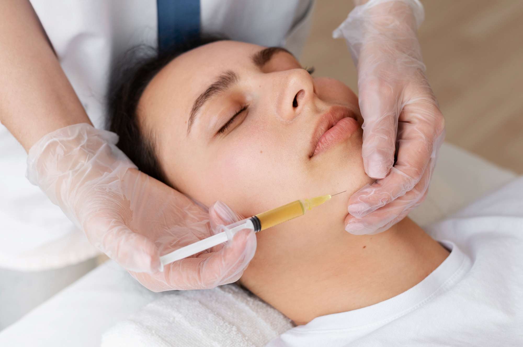 Dermatologist examining patient